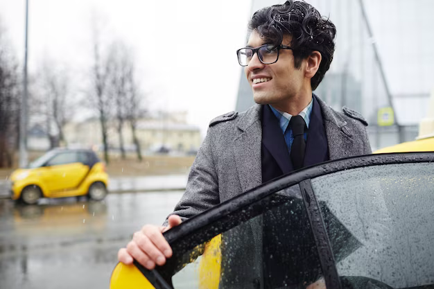 A man hails a taxi in the city